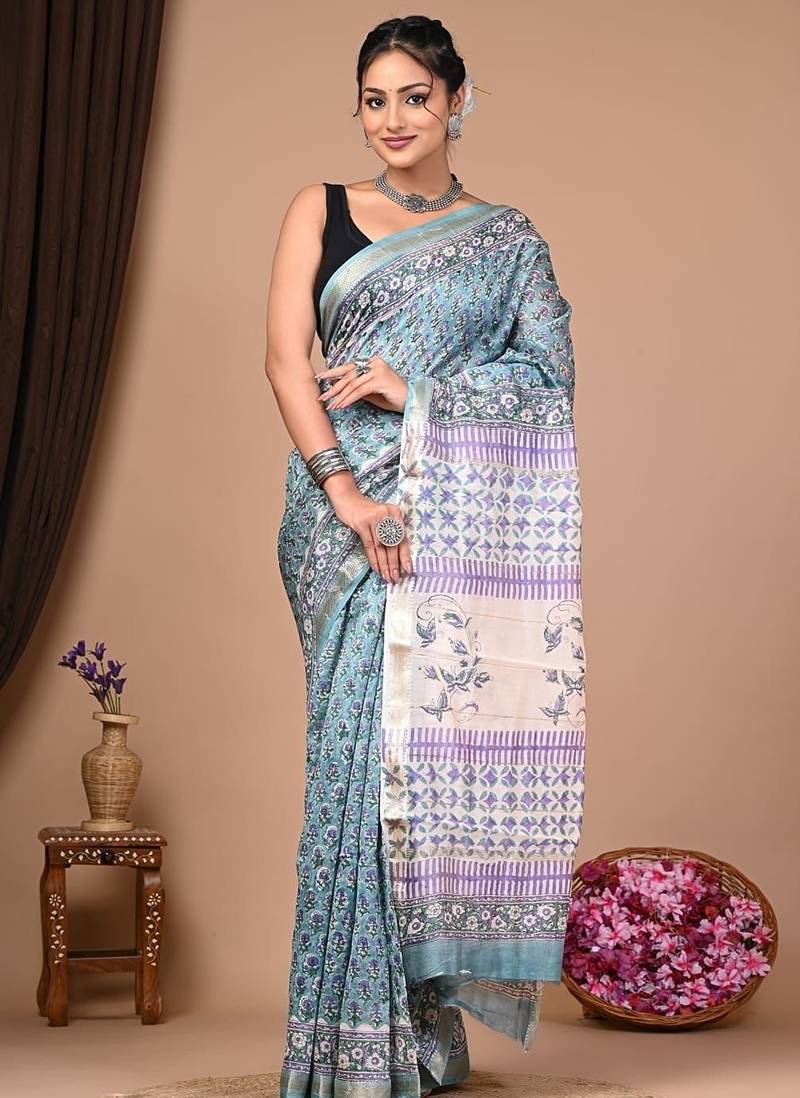 Light grey maheshwari silk saree with woven borders and beautiful hand block print