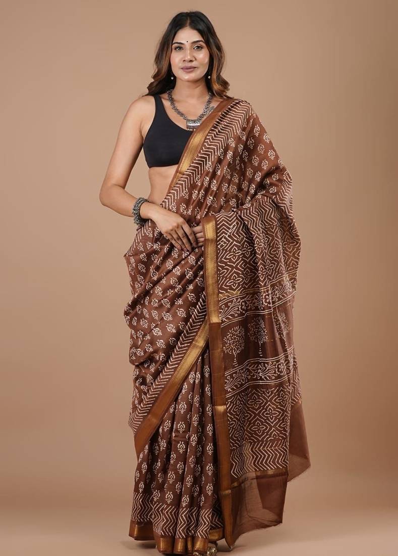 Brown maheshwari silk saree with woven borders and beautiful hand block print