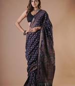 Black maheshwari silk saree with woven borders and beautiful hand block print