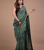 Green maheshwari silk saree with woven borders and beautiful hand block print
