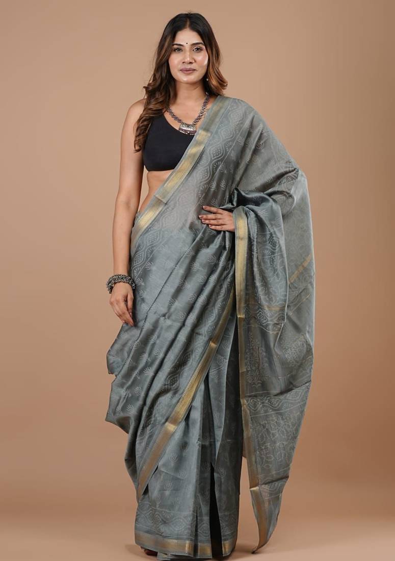 Grey maheshwari silk saree with woven borders and beautiful hand block print