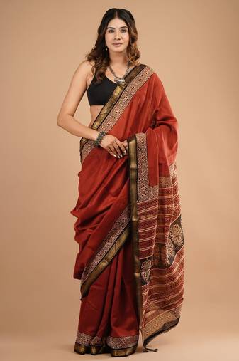 Red maheshwari silk saree with woven borders and beautiful hand block print