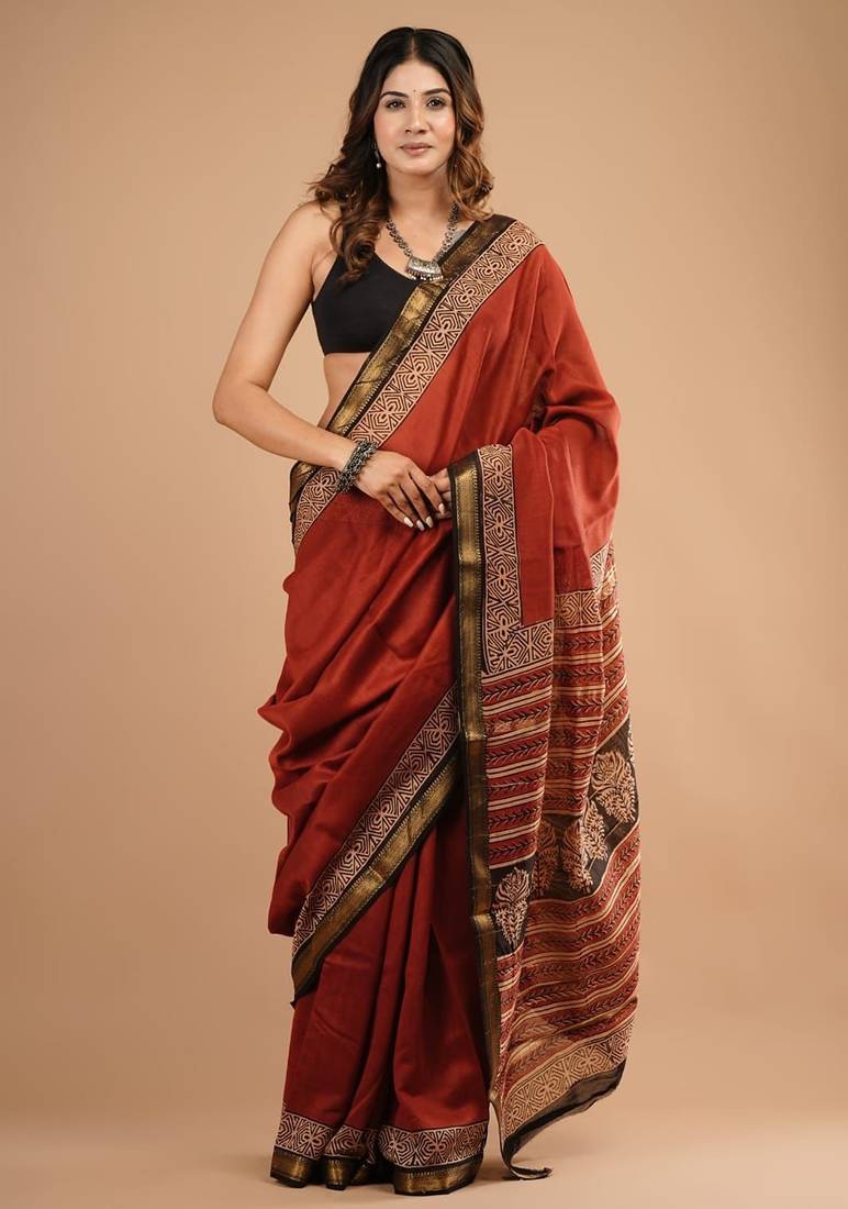 Red maheshwari silk saree with woven borders and beautiful hand block print