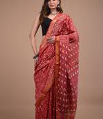 Red maheshwari silk saree with woven borders and beautiful hand block print