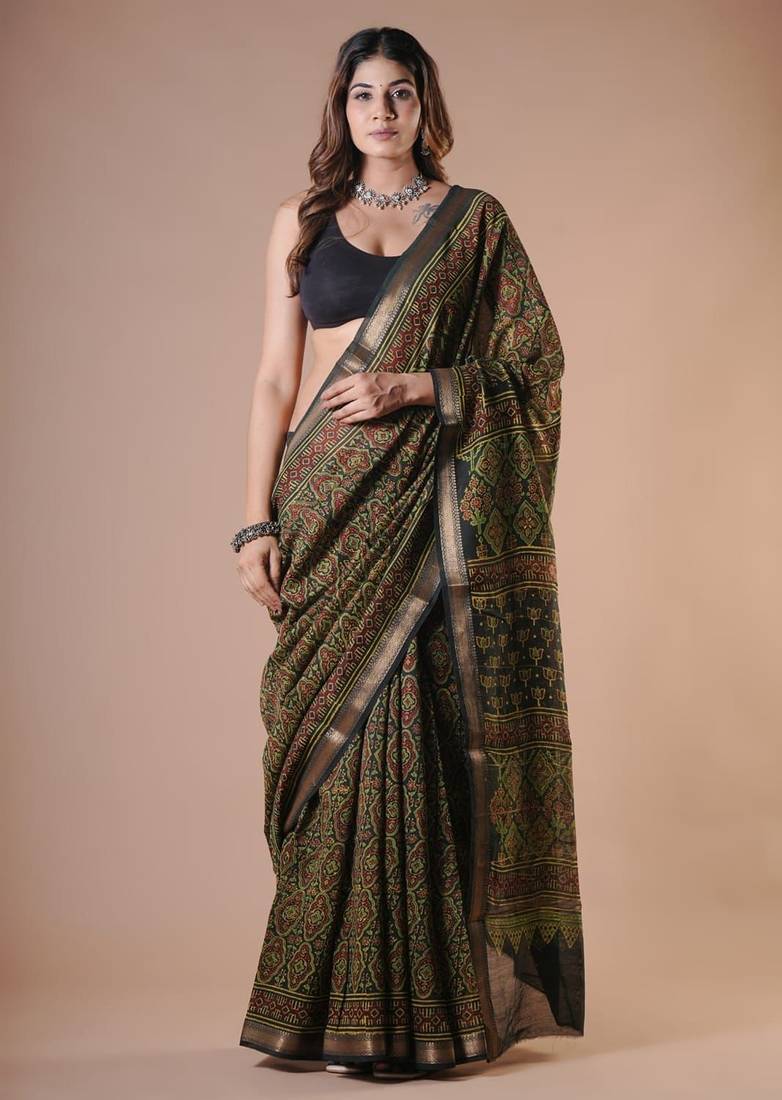 Green maheshwari silk saree with woven borders and beautiful hand block print