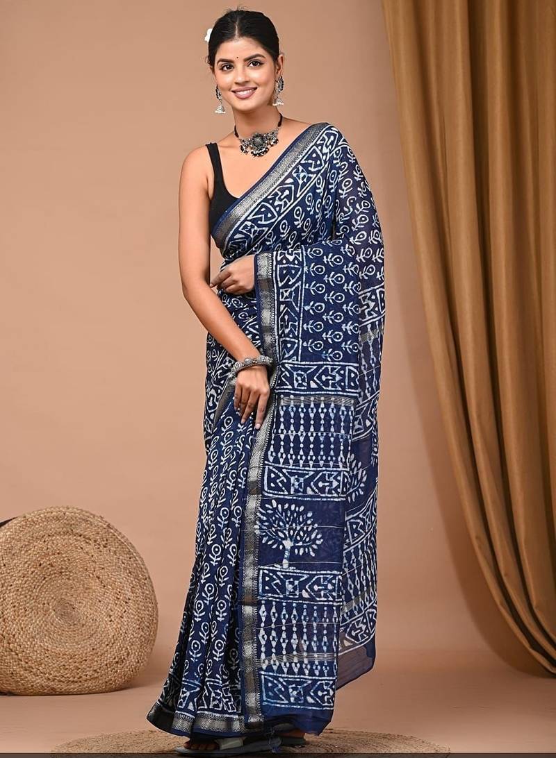 Blue maheshwari silk saree with woven borders and beautiful hand block print