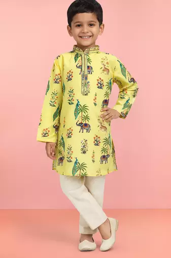 Boys yellow rayon all-over digital animal print kurta cream pant set