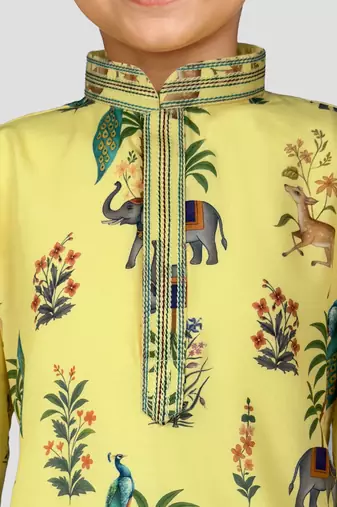 Boys yellow rayon all-over digital animal print kurta cream pant set