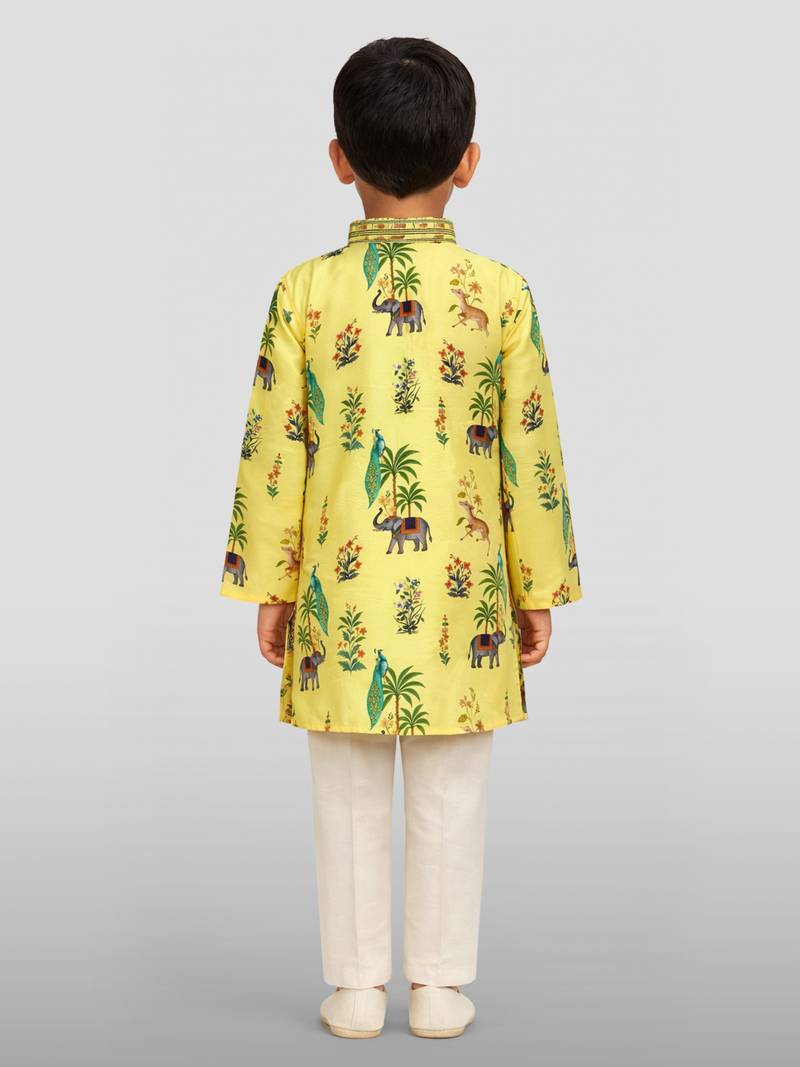 Boys yellow rayon all-over digital animal print kurta cream pant set