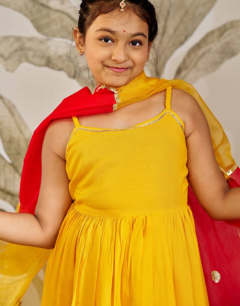 Girls mustard rayon kurta palazzo set with dupatta