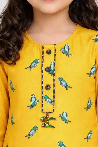 Girls yellow cotton animal print kurta with salwar set | three quarter sleeves | straight cut | festive ethnic wear