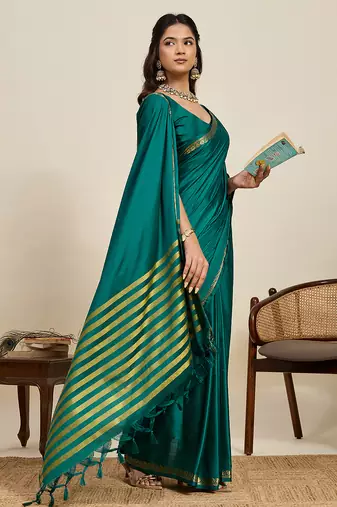 Teal green striped, solid soft silk banarasi saree with blouse