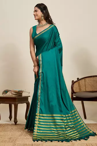 Teal green striped, solid soft silk banarasi saree with blouse