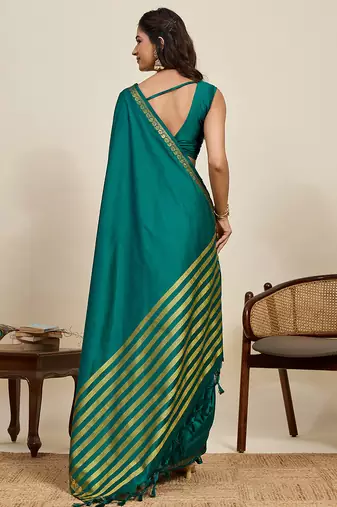 Teal green striped, solid soft silk banarasi saree with blouse