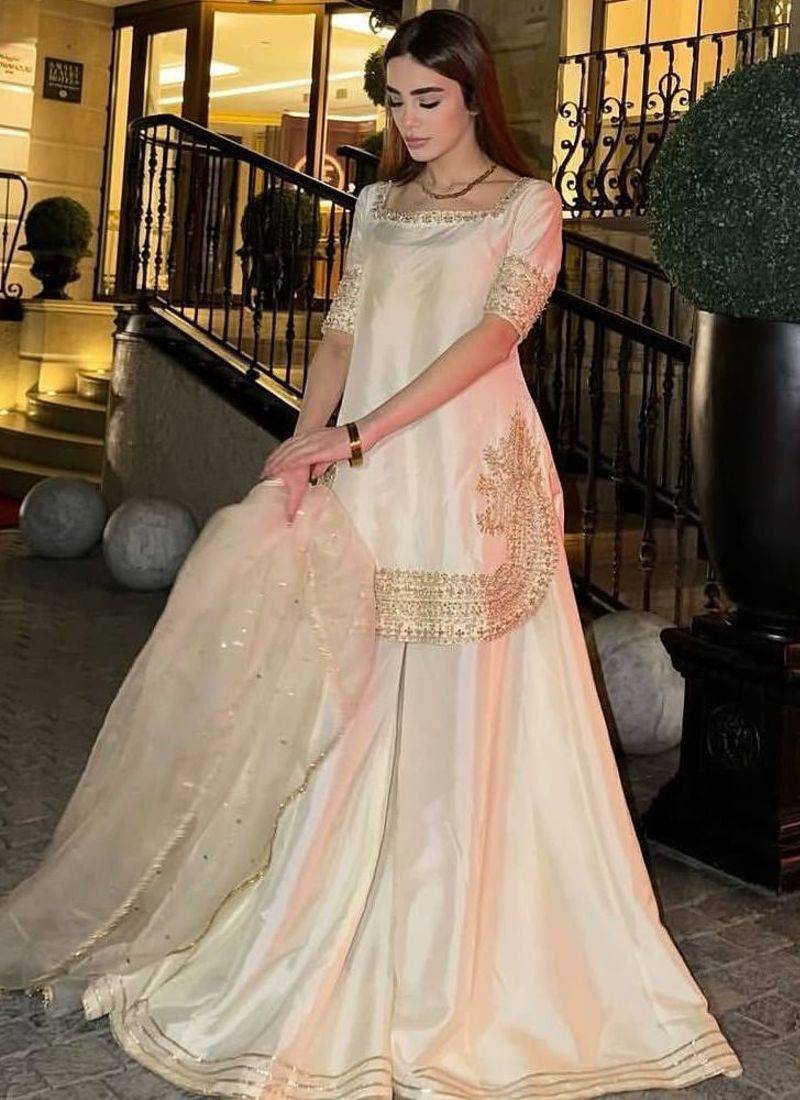 White gold-border sharara suit