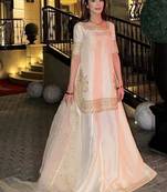 White gold-border sharara suit