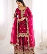 Rani pink heavily embroidered silk blend sharara set