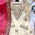 Cream kameez with rani pink palazzo embroidered suit