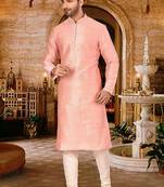 Pink dupion art silk  kurta with pattern work and 8 button churidar