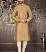 Beige dupion art silk  kurta with pattern work and 8 button churidar