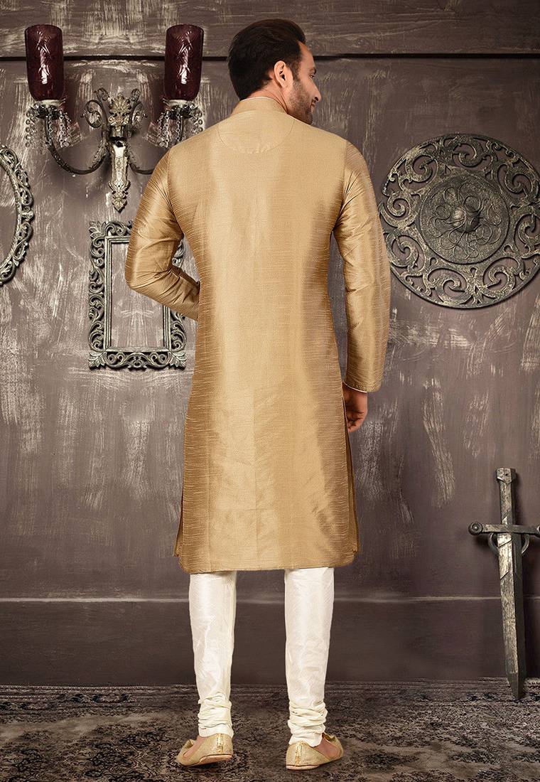 Beige dupion art silk  kurta with pattern work and 8 button churidar