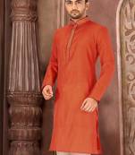 Orange dupion art silk  kurta with pattern work and dk work churidar
