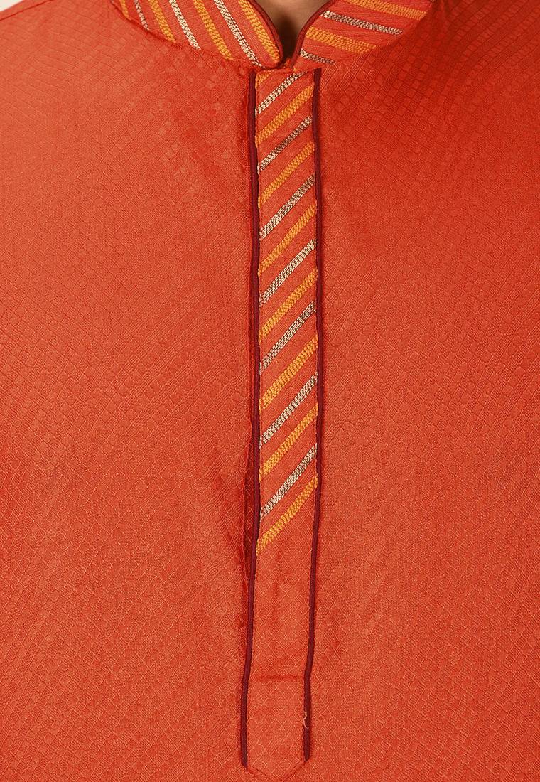Orange dupion art silk  kurta with pattern work and dk work churidar