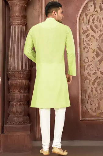 green cotton kurta with white churidar set