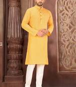 Yellow cotton  kurta with pattern work&wooden button churidar