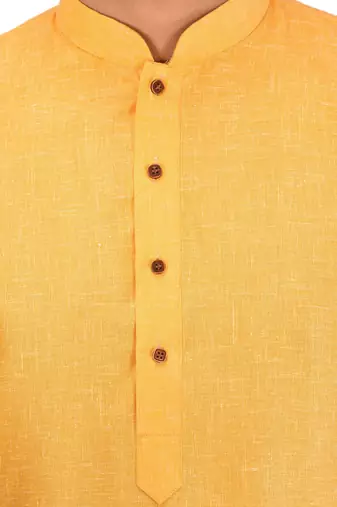 yellow cotton kurta with white churidar set