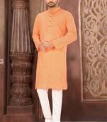 Orange cotton  kurta with pattern work&wooden button churidar