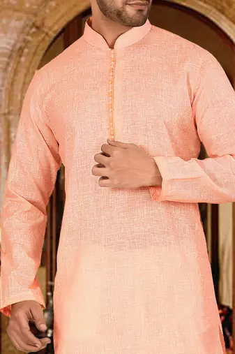 peach cotton kurta with cream churidar set
