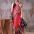 Red satin abstract print saree