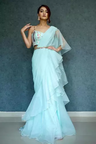 Sky blue ruffled saree with embellished bustier