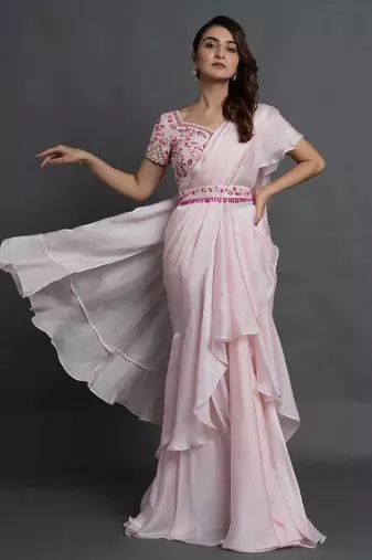 Pink ruffled saree with embellished bustie
