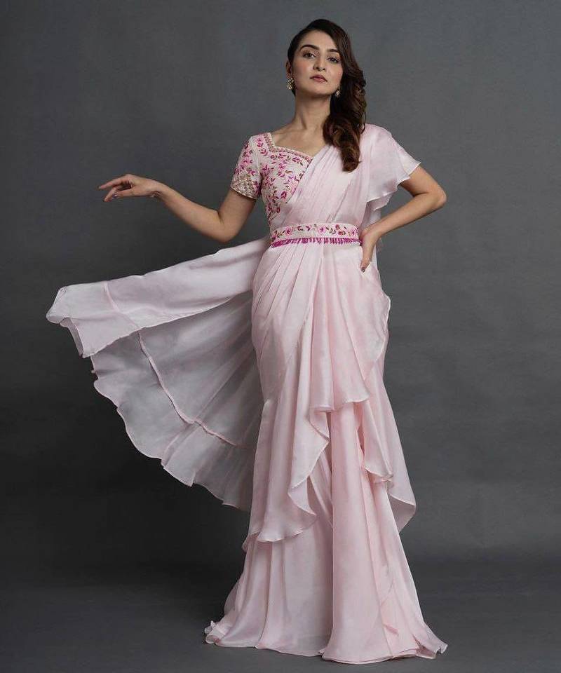 Pink ruffled saree with embellished bustie