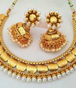 Magnificent Mahalaxmi Gold Coin Necklace Set in Perfect harmony with Pearls.