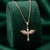 925 sterling silver rose gold-plated winged cross pendant necklace with crystal detailing for women