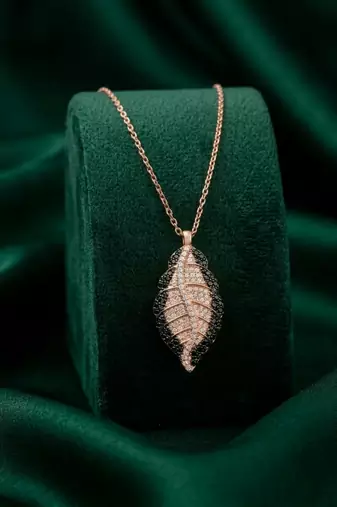 925 sterling silver rose gold-plated leaf pendant necklace with dual-tone crystal detailing for women