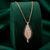 925 sterling silver rose gold-plated leaf pendant necklace with dual-tone crystal detailing for women
