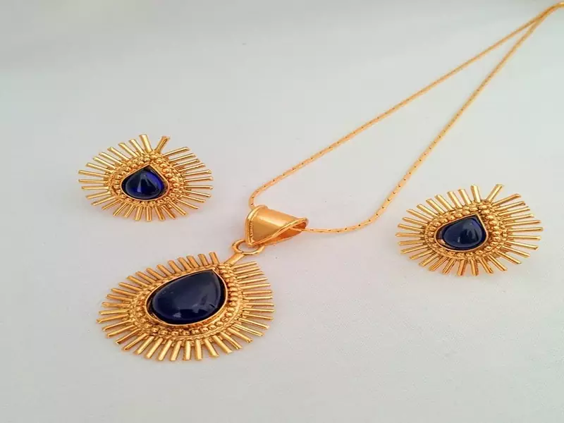 Radiant Rays Designer Gold Pendant Set