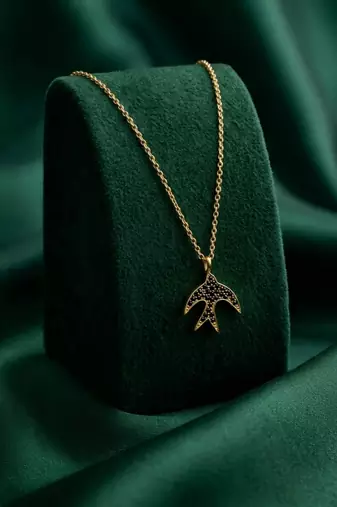 925 sterling silver gold-plated bird pendant necklace with textured detailing for women