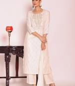 Off white art silk embroidered suit