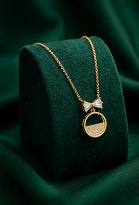 925 sterling silver gold-plated bow & circle pendant necklace with crystal detailing for women 2