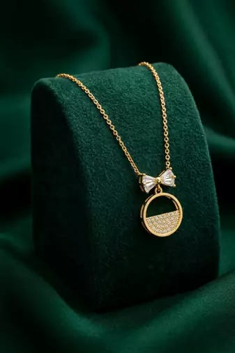 925 sterling silver gold-plated bow & circle pendant necklace with crystal detailing for women