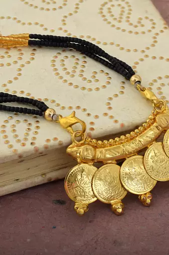 gold plated lakshmi coin mangalsutra with black beads