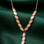 rose gold leaf link drop necklace in 925 sterling silver | elegant nature-inspired statement necklace for women