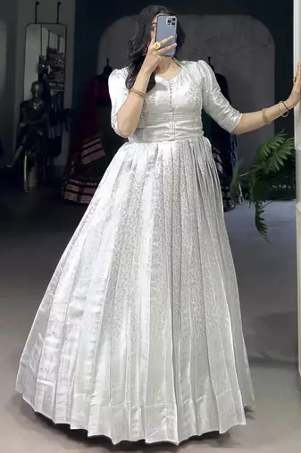 Awesome Off-White Zari Weaving Silk Festive Wear Gown With Koti