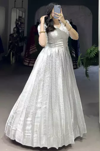 Awesome Off-White Zari Weaving Silk Festive Wear Gown With Koti