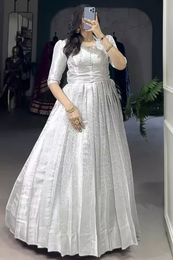 Awesome Off-White Zari Weaving Silk Festive Wear Gown With Koti